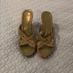 Green heeled sandals.